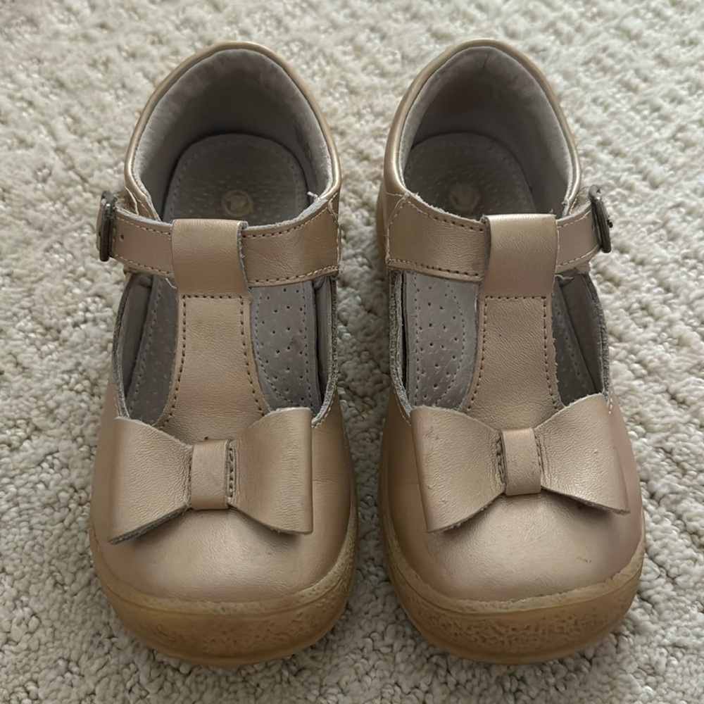 L’Amour gold bow shoes